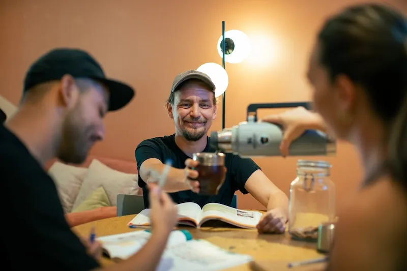 Student sharing mate with classmates during a study session in Buenos Aires
