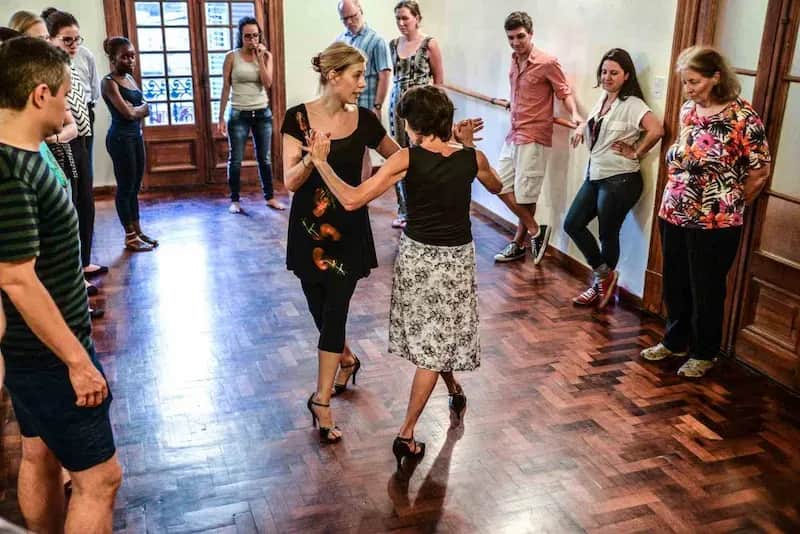 50+ Program students participating in a private tango class in Buenos Aires.
