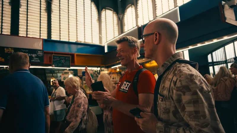 Two 50+ Program students enjoying a guided market visit with the Expanish group.