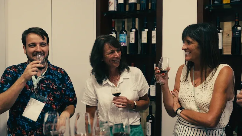 50+ Program students enjoying a guided wine tasting at a local venue.